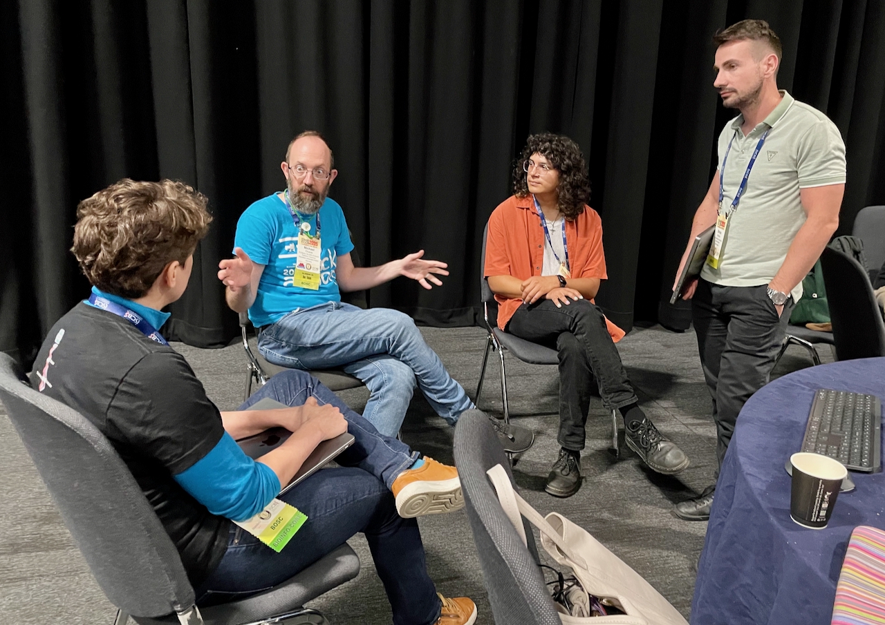 Geraldine, Michael and Dorian talking.